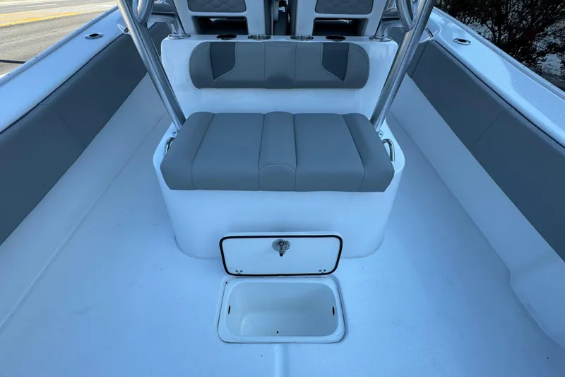 Slide: The Image of 2026 Cape Horn 31 T boat with T-top and seating, displayed outdoors. - 11