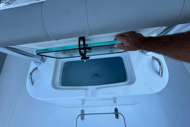 Slide: The Image of 2026 Cape Horn 31 T boat with Garmin equipment, docked under clear blue sky. - 12