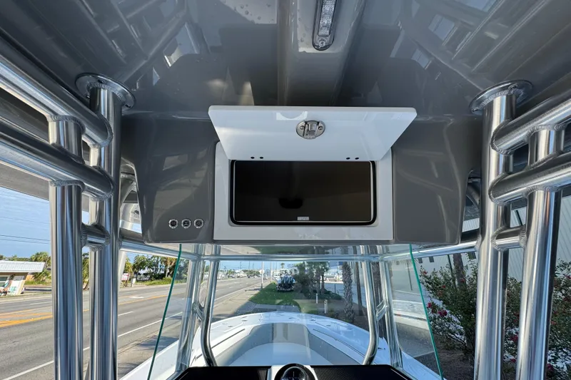 Slide: The Image of 2026 Cape Horn 31 T boat with Garmin equipment, docked under clear blue sky. - 19