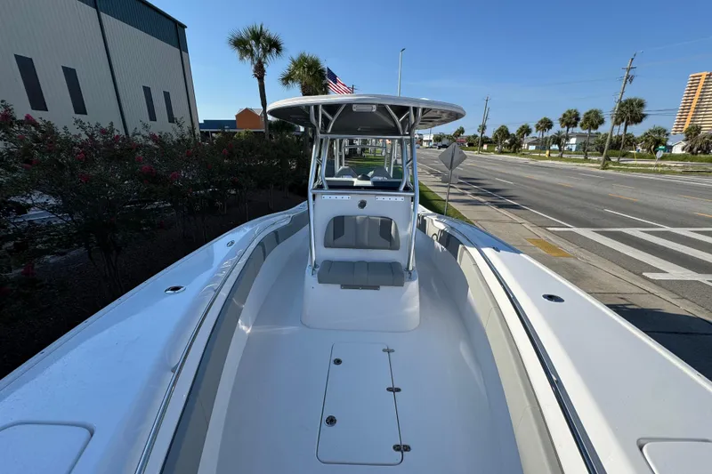 Slide: The Image of 2026 Cape Horn 31 T boat with dual engines and stainless steel rod holders. - 25