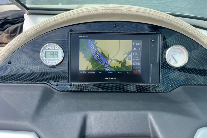 Slide: The Image of Dashboard of a 2019 Regal 23 OBX boat with Garmin GPS display. - 5