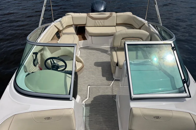 Slide: The Image of 2019 Regal 23 OBX boat interior with open storage compartments and seating. - 9
