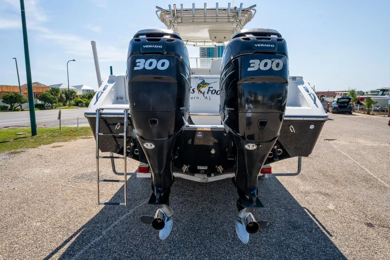 Slide: The Image of Orange Beach boat sales advertisement with service highlights. - 5