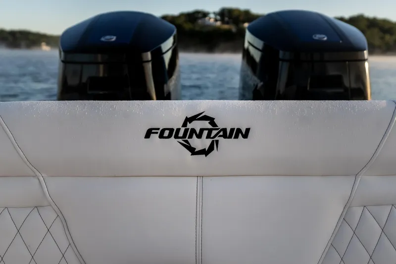 Slide: The Image of 2026 Fountain 39 DX boat with dual engines on a misty water backdrop. - 15