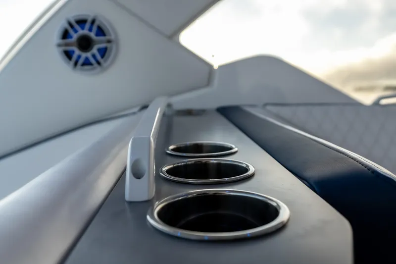 Slide: The Image of Interior view of 2026 Fountain 39 DX boat with cup holders and speaker. - 20