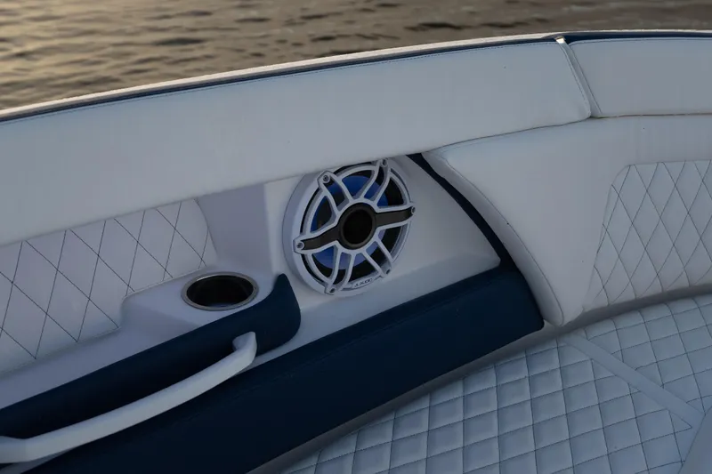 Slide: The Image of 2026 Fountain 39 DX boat interior with speaker and quilted upholstery. - 22