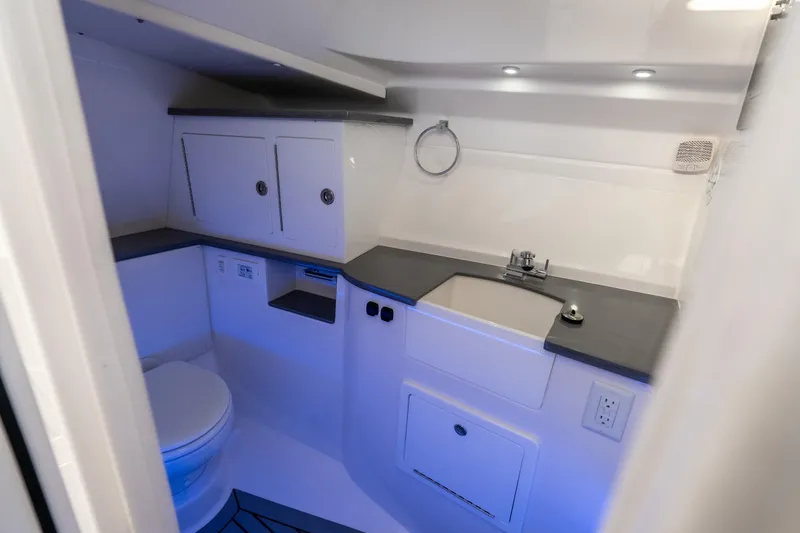 Slide: The Image of Modern bathroom interior of 2026 Fountain 39 DX boat, featuring sleek design and efficient layout. - 25