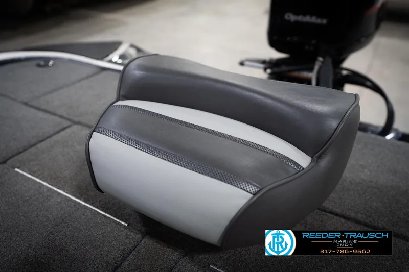 Slide: The Image of 2015 Triton 18TRX boat seat, gray and white upholstery, Reeder-Trausch Marine logo visible. - 41
