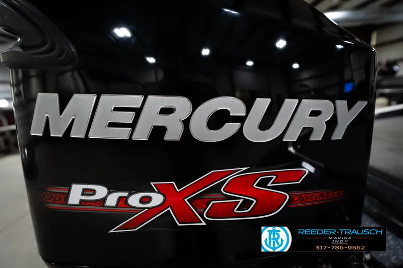 Slide: The Image of Mercury Pro XS engine on 2015 Triton 18TRX boat, Reeder-Trausch Marine logo visible. - 46