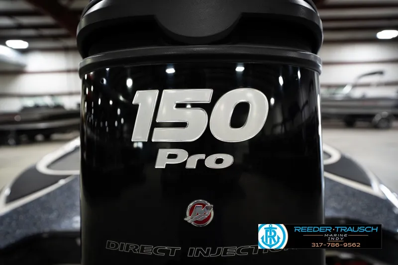 Slide: The Image of Close-up of a 2015 Triton 18TRX boat engine with "150 Pro" label. - 47