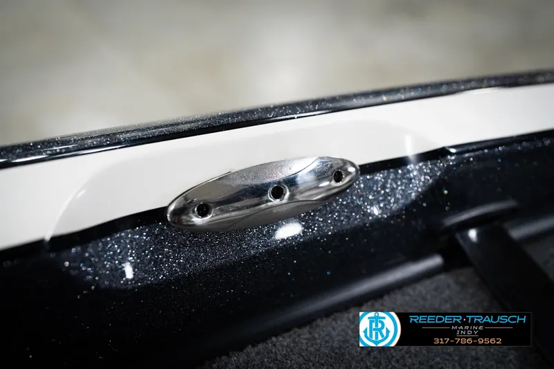 Slide: The Image of 2015 Triton 18TRX boat detail with metallic finish and chrome hardware. - 58