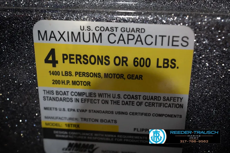 Slide: The Image of 2015 Triton 18TRX boat capacity label, 4 persons or 600 lbs, 200 HP motor. - 60