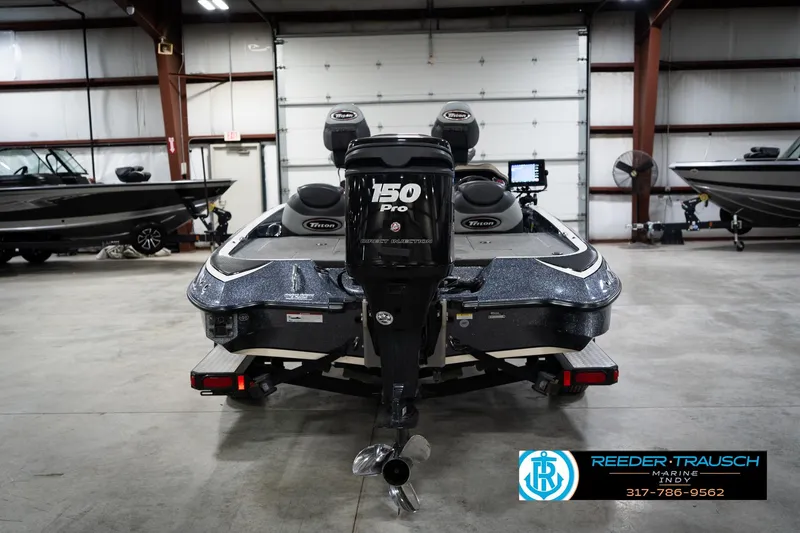 Slide: The Image of 2015 Triton 18TRX boat with 150 Pro motor in a showroom. - 7