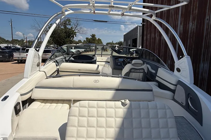 Slide: The Image of 2019 Cobalt R3 boat interior with white seating and sleek design. - 4