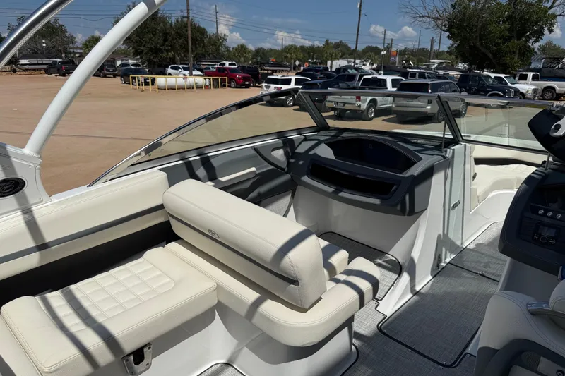 Slide: The Image of 2019 Cobalt R3 boat interior with white seating and modern dashboard design. - 6