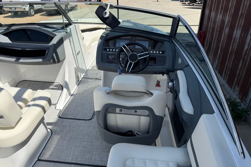Slide: The Image of 2019 Cobalt R3 boat interior with steering wheel and seating, featuring modern design elements. - 7