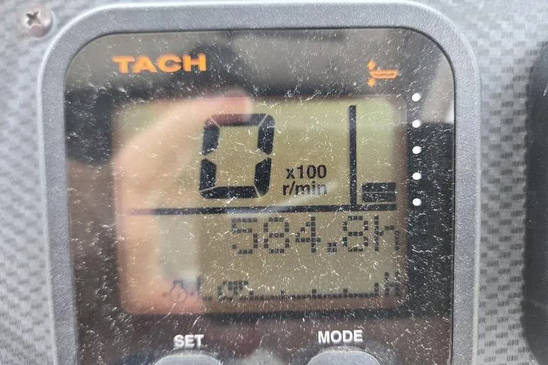 Slide: The Image of Tachometer display of 2007 Grady-White Seafarer 228 showing 584.8 hours. - 6