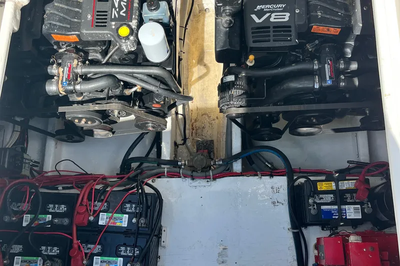 Slide: The Image of Engine compartment of a 2001 Cruisers Yachts 3470 Express with dual Mercury V8 engines. - 19
