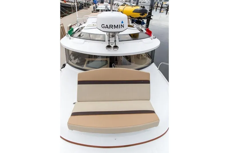 Slide: The Image of Manufacturer Provided Image: 2022 Ranger Tugs R-27 boat with Garmin radar and cushioned seating. - 8