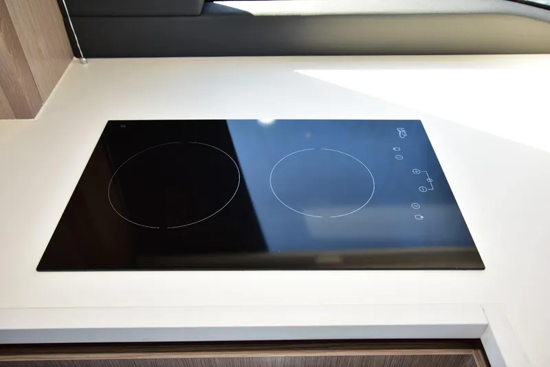 Slide: The Image of Modern induction cooktop on Sealine C430 yacht, 2022 model. - 19