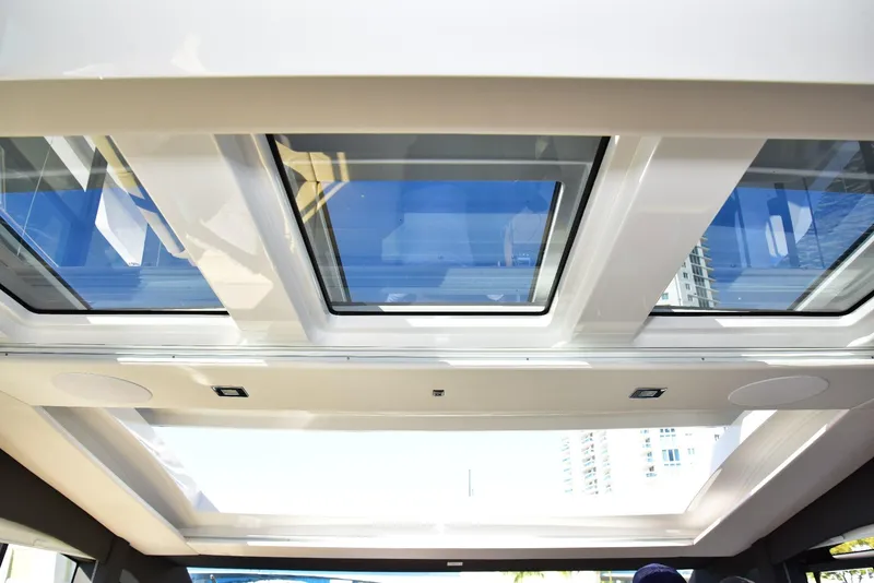 Slide: The Image of Sealine C430 2022 yacht interior with panoramic sunroof and modern design. - 29
