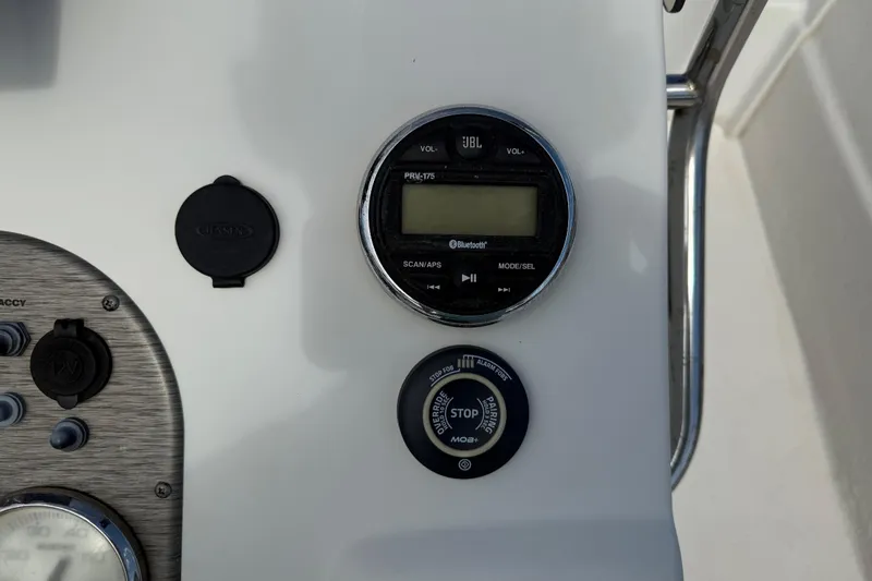 Slide: The Image of Control panel of 2016 Carolina Skiff 218 DLV with JBL Bluetooth system. - 18