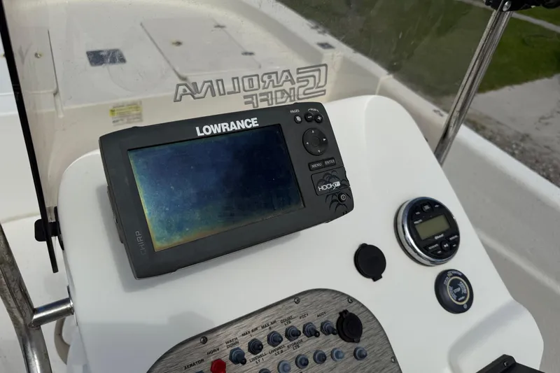 Slide: The Image of Control panel of a 2016 Carolina Skiff 218 DLV with Lowrance navigation system. - 19