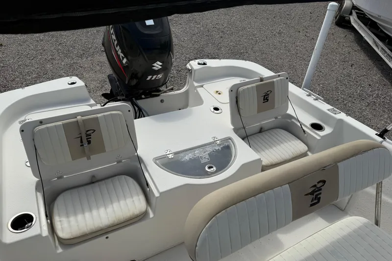 Slide: The Image of 2016 Carolina Skiff 218 DLV boat interior with Suzuki 115 outboard motor. - 20