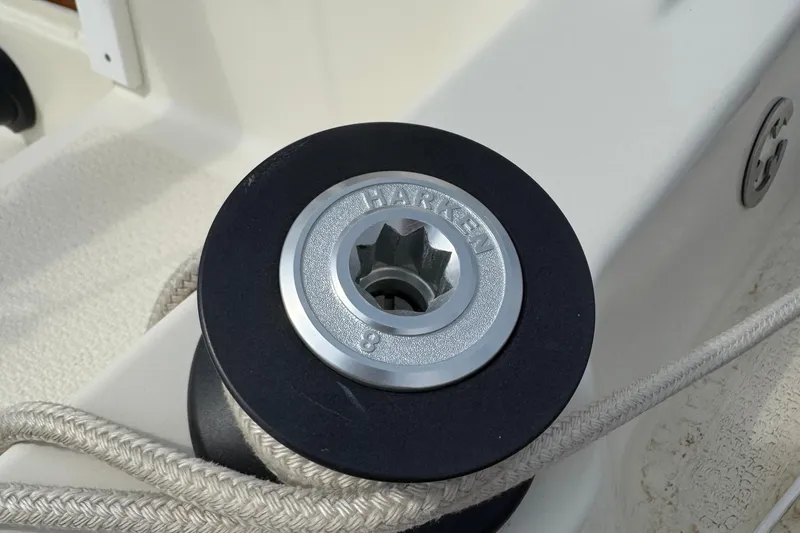 Slide: The Image of Harken winch on 2022 Com-Pac CP 23 Pilothouse sailboat, featuring durable rope. - 27