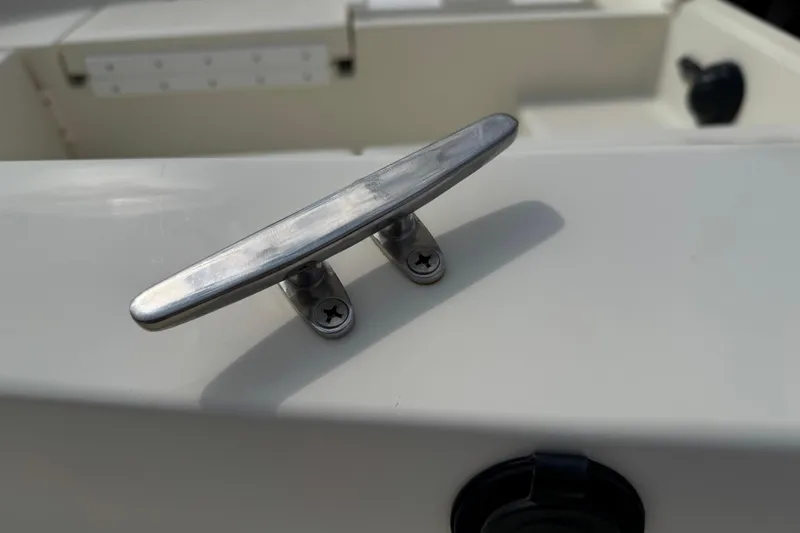 Slide: The Image of Stainless steel cleat on 2022 Com-Pac CP 23 Pilothouse boat deck. - 28