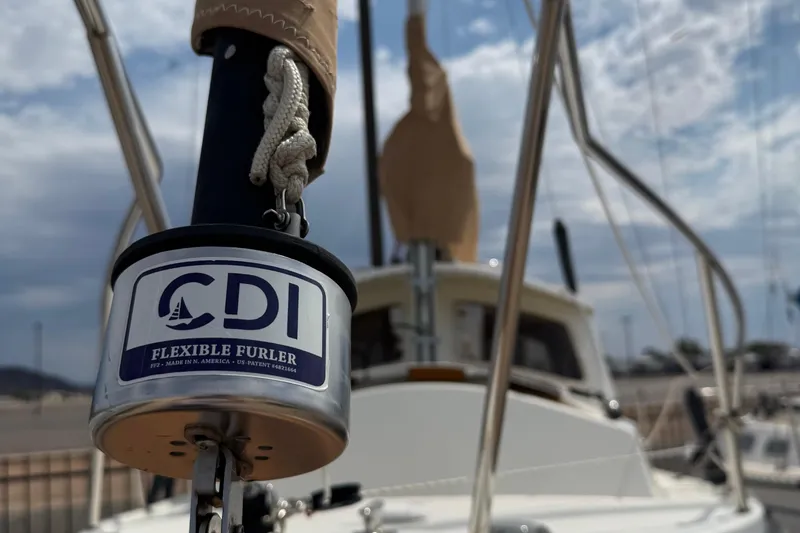 Slide: The Image of 2022 Com-Pac CP 23 Pilothouse sailboat with CDI flexible furler in marina. - 29