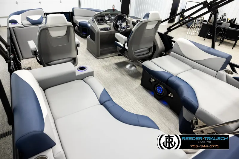 Slide: The Image of Luxurious interior of 2026 Avalon LSZ QLS pontoon boat with plush seating and modern dashboard. - 11