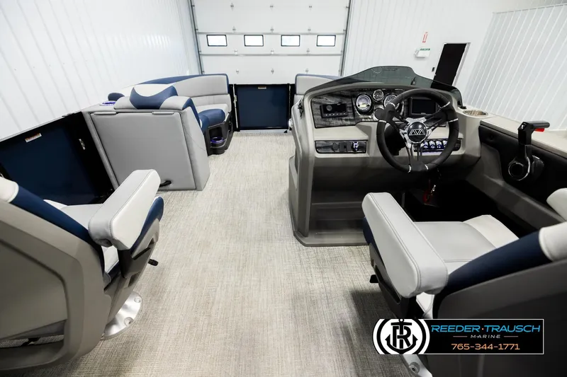 Slide: The Image of Interior of 2026 Avalon LSZ QLS boat with modern seating and control panel. - 17