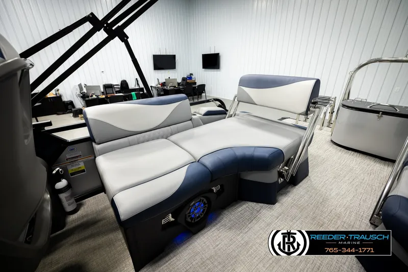 Slide: The Image of 2026 Avalon LSZ QLS boat interior with luxurious seating in a showroom setting. - 20