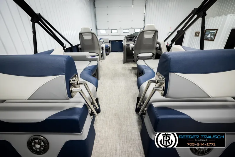 Slide: The Image of Interior of 2026 Avalon LSZ QLS pontoon boat with blue and gray seating. - 27