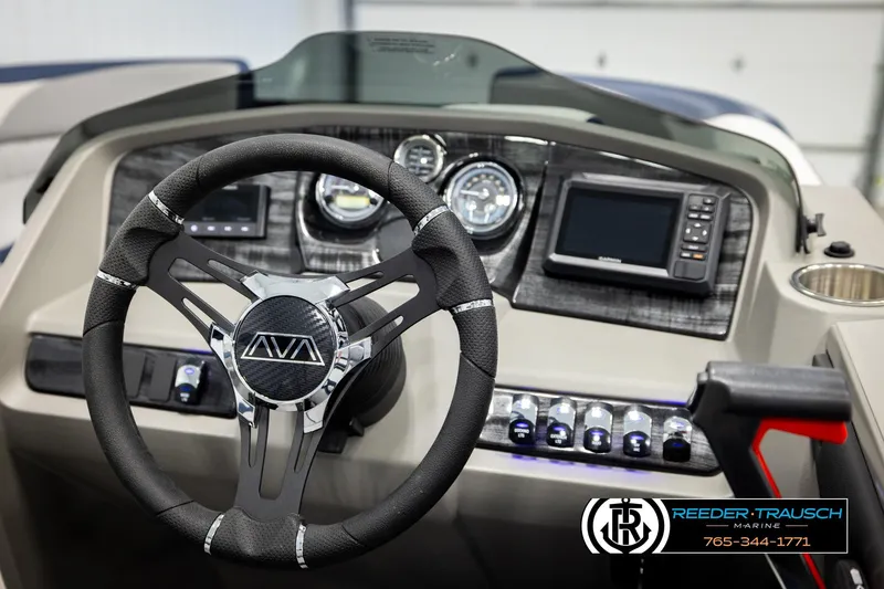 Slide: The Image of Steering wheel and dashboard of 2026 Avalon LSZ QLS boat with modern controls. - 32