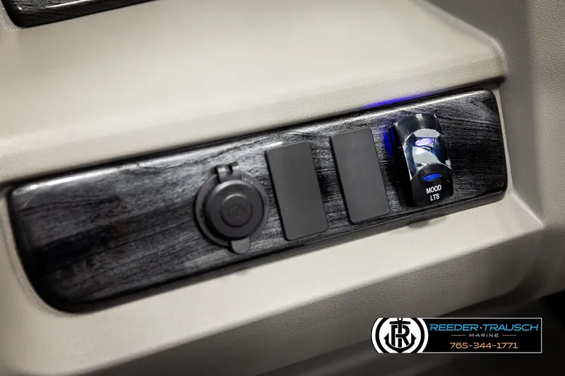 Slide: The Image of Control panel of 2026 Avalon LSZ QLS with mood lighting switch and 12V outlet. - 35