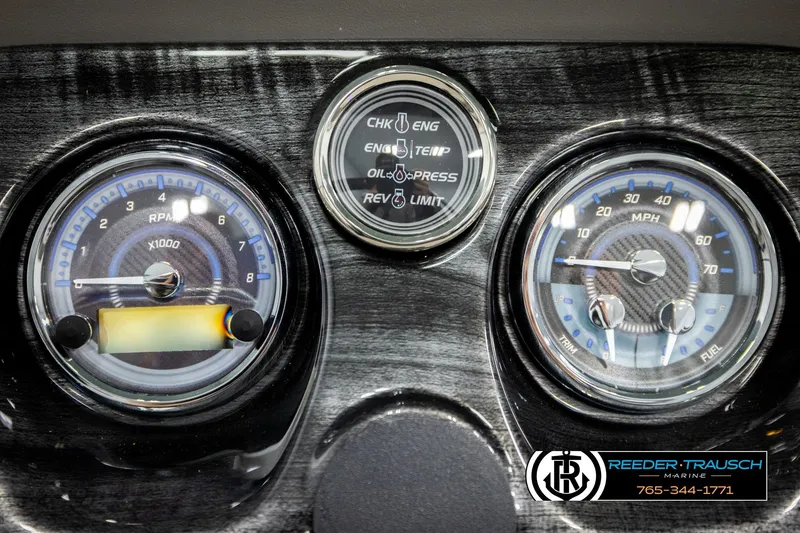 Slide: The Image of Dashboard of 2026 Avalon LSZ QLS with RPM and speed gauges, Reeder-Trausch Marine branding. - 37