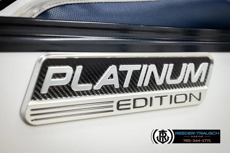 Slide: The Image of 2026 Avalon LSZ QLS Platinum Edition badge with Reeder-Trausch Marine logo. - 54