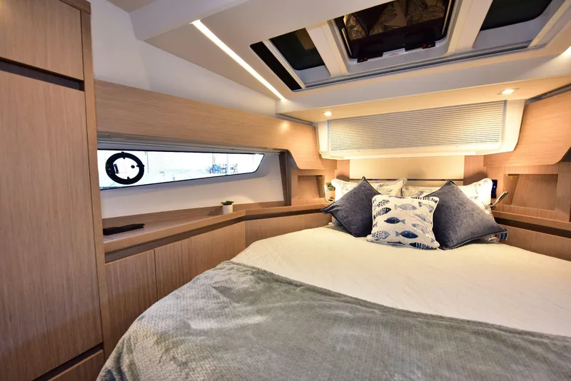 Slide: The Image of Luxurious cabin interior of 2022 Sealine C430 yacht with modern design and cozy bedding. - 44