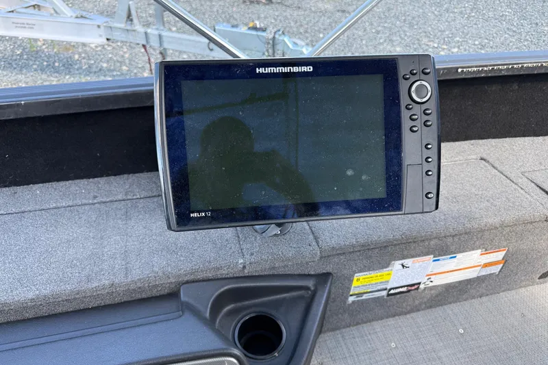 Slide: The Image of Humminbird Helix 12 fish finder on 2019 Alumacraft Competitor 185 CS boat dashboard. - 13
