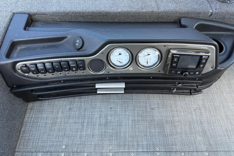 Slide: The Image of 2019 Alumacraft Competitor 185 CS dashboard with gauges and control panel. - 15