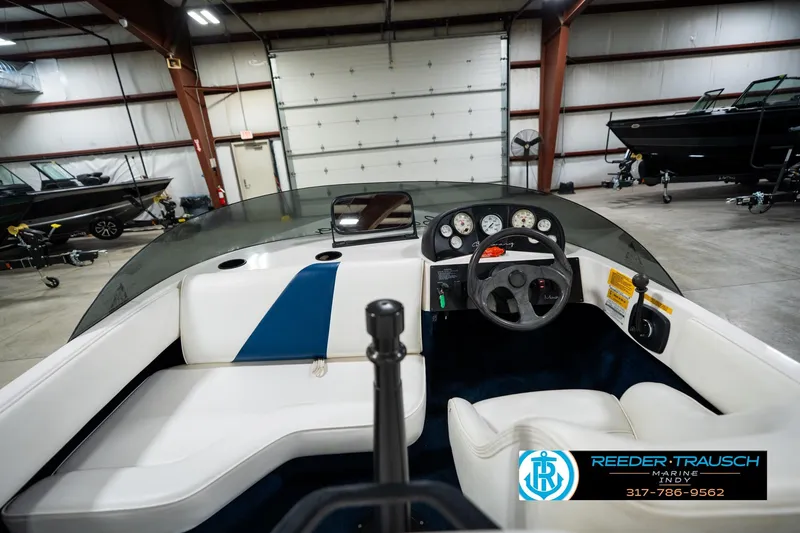 Slide: The Image of 1997 Moomba Boomerang boat interior in a spacious storage facility. - 16
