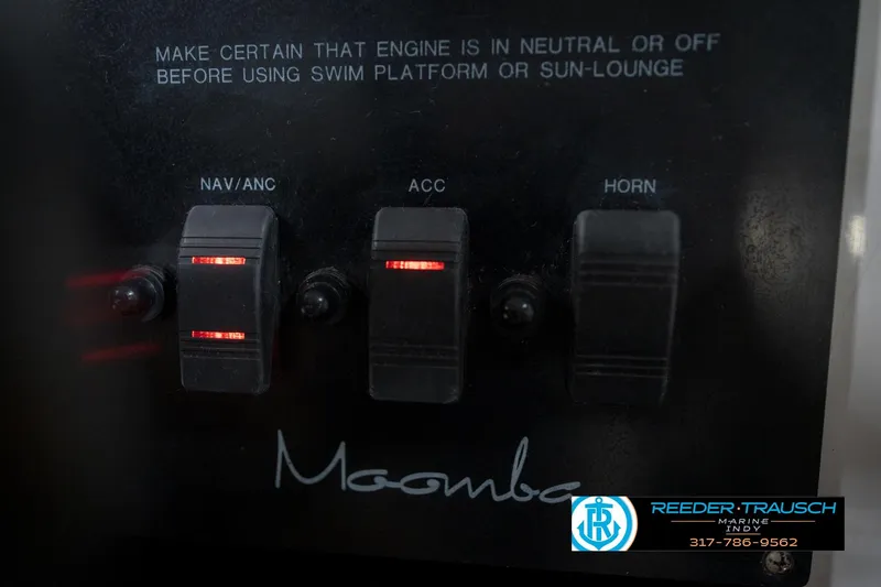 Slide: The Image of Dashboard gauges of a 1997 Moomba Boomerang boat, showing speed, oil, volts, and time. - 28