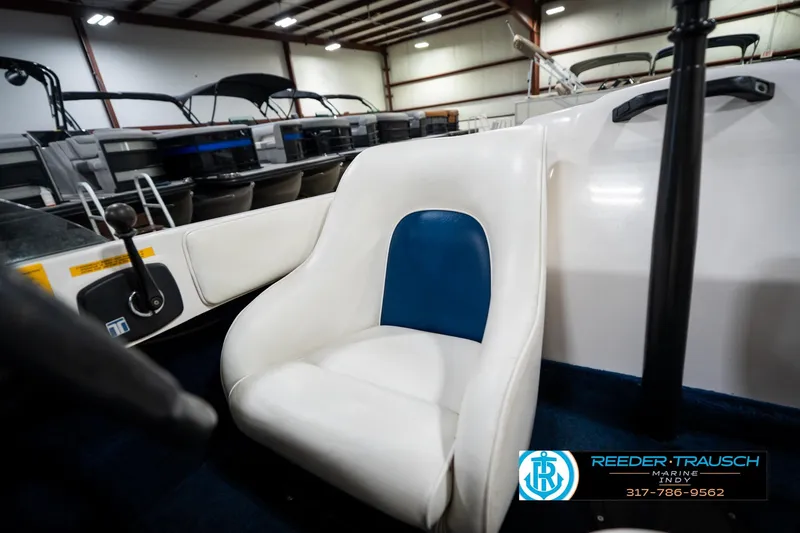 Slide: The Image of 1997 Moomba Boomerang boat interior with control lever and dashboard details. - 30