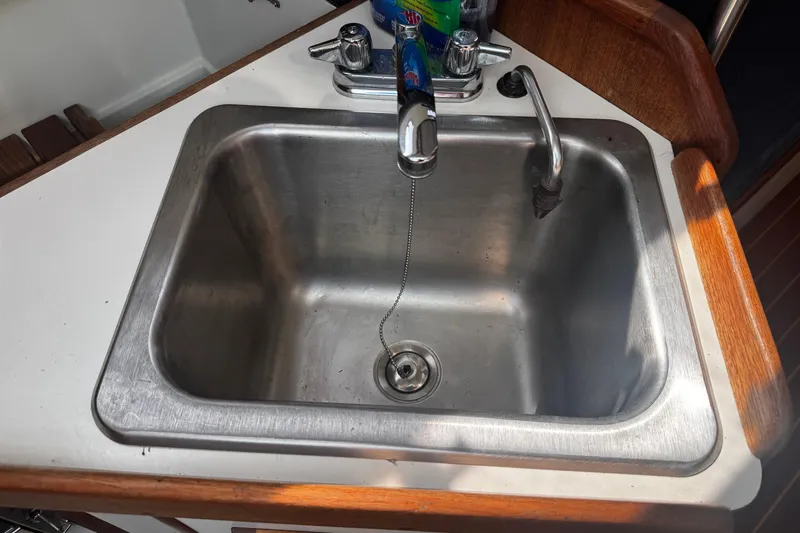 Slide: The Image of Stainless steel sink in 1990 Tartan Thomas 35 yacht galley. - 28
