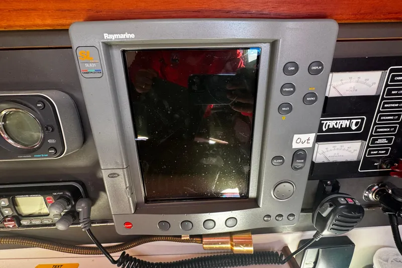 Slide: The Image of Raymarine chartplotter and control panel on 1990 Tartan Thomas 35 sailboat. - 31