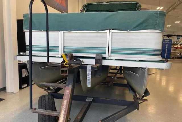 Slide: The Image of 2001 Odyssey Pontoons 1703 Millennium on trailer in showroom. - 4