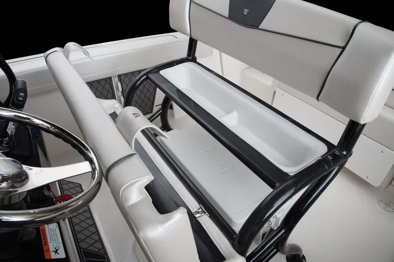 Slide: The Image of Manufacturer Provided Image: 2017 Wellcraft 222 Fisherman boat interior with steering wheel and seating. - 8