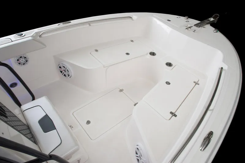 Slide: The Image of Manufacturer Provided Image: 2017 Wellcraft 222 Fisherman boat interior with storage compartments and seating. - 9